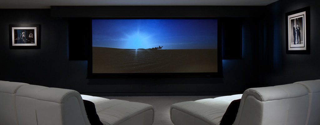 Same theater with the projection screen lowered for movie night