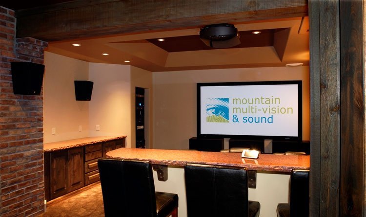 Projection screen theater with bar seating